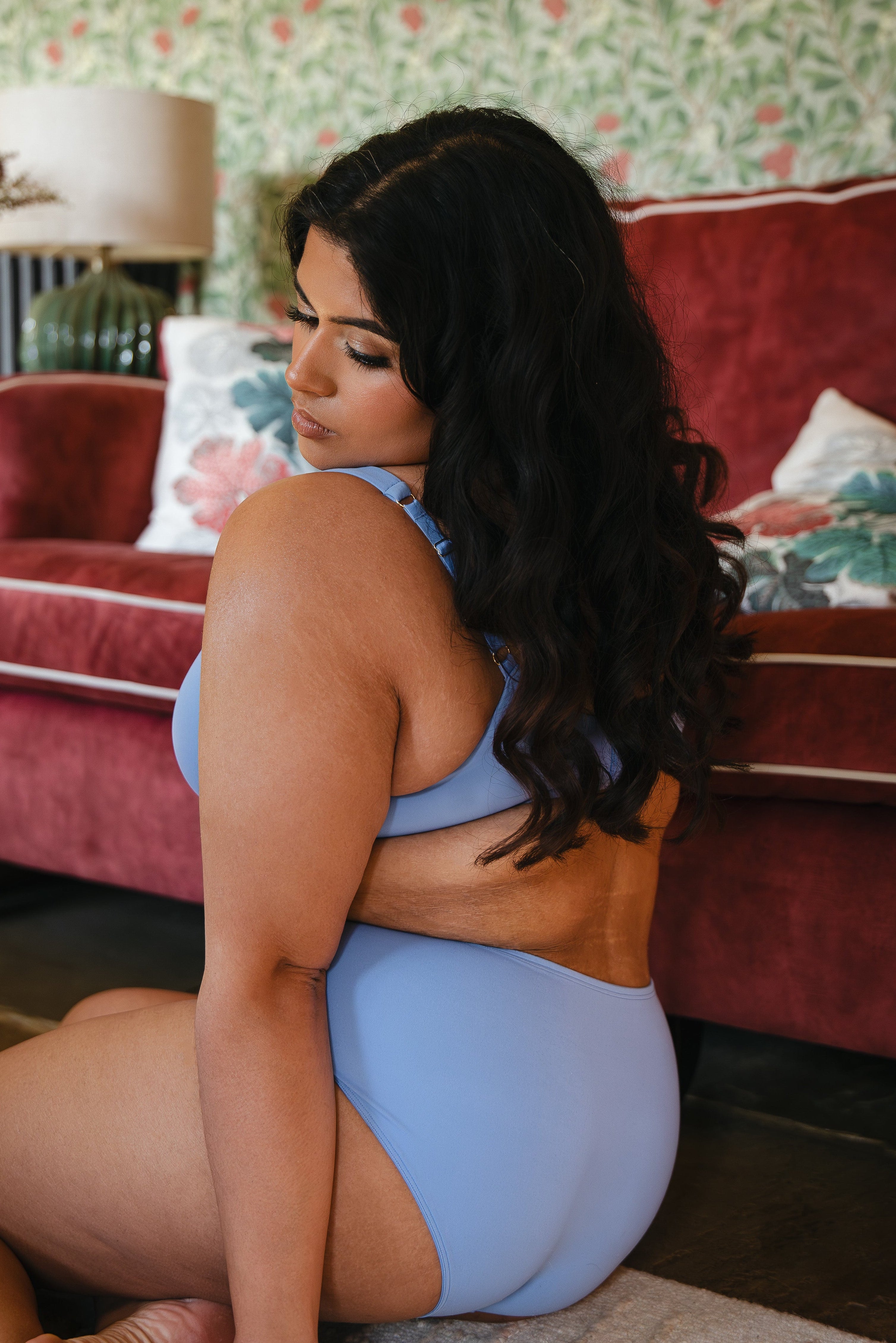 Model wearing modal cornflower blue underwired bra and modal boyshort lingerie set