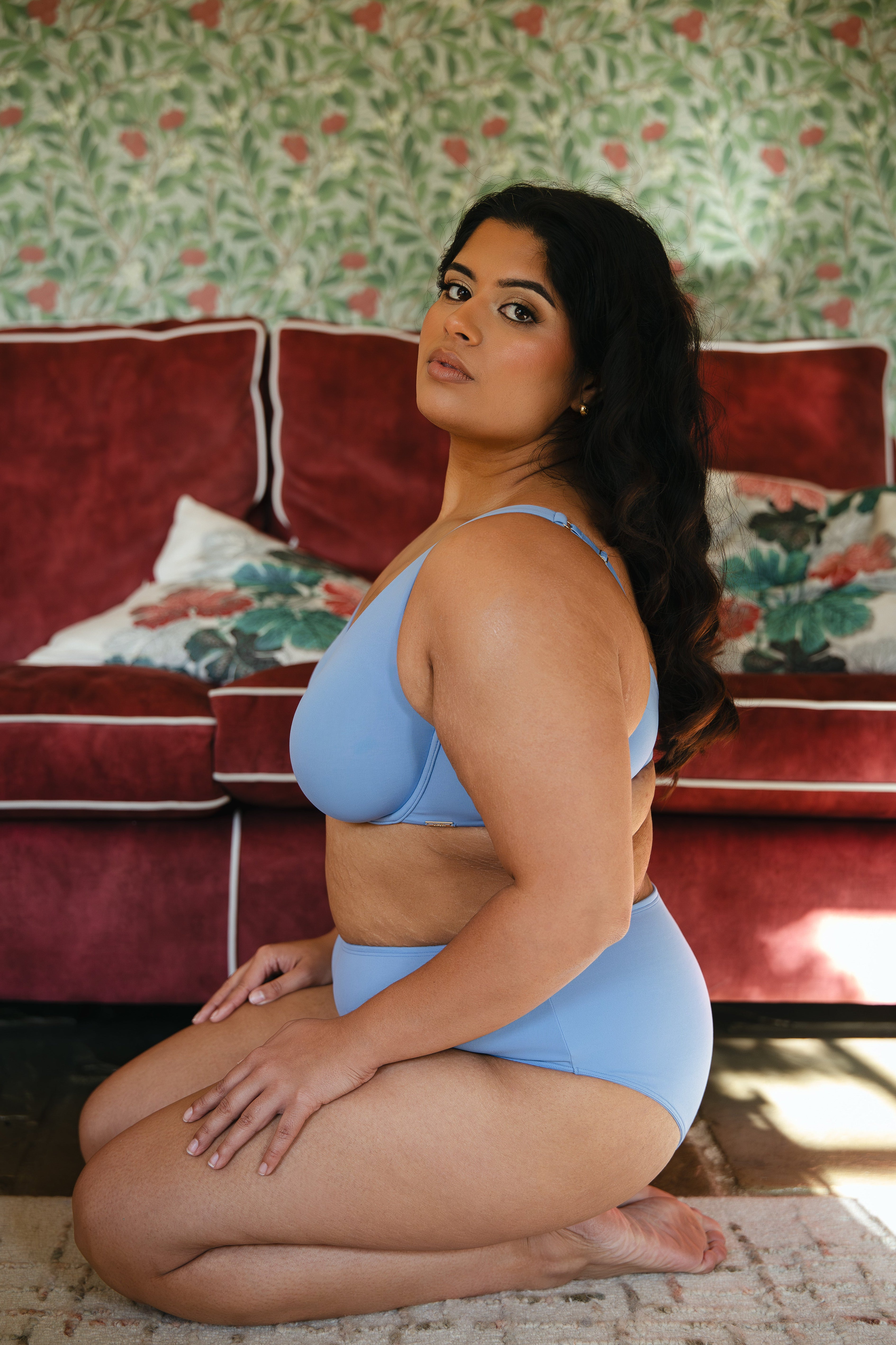 Model wearing modal cornflower blue underwired bra and modal boyshort lingerie set