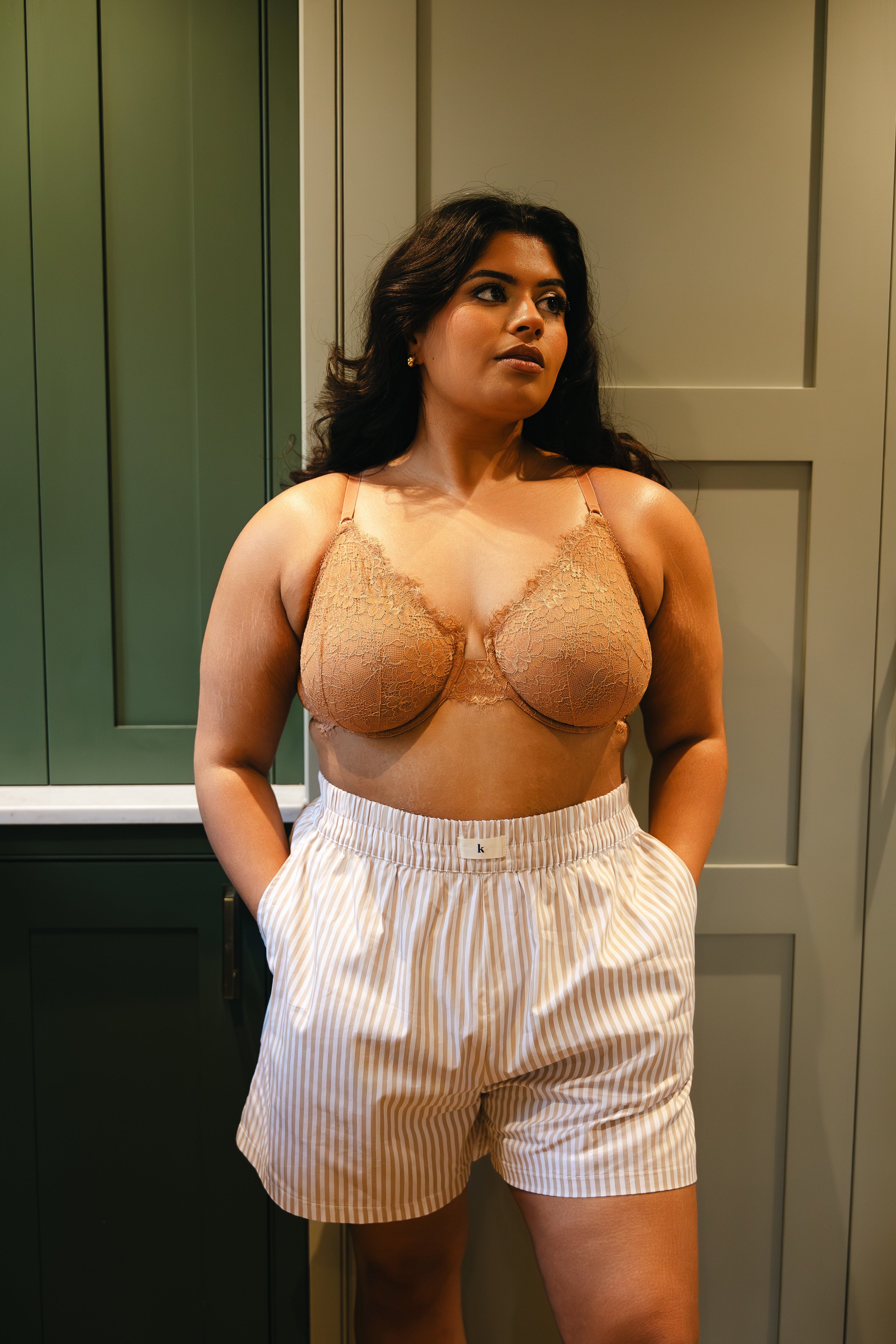 Model wearing pyjama neutral stripe foldover waistband boxer shorts with mocha mousse lace underwired bra